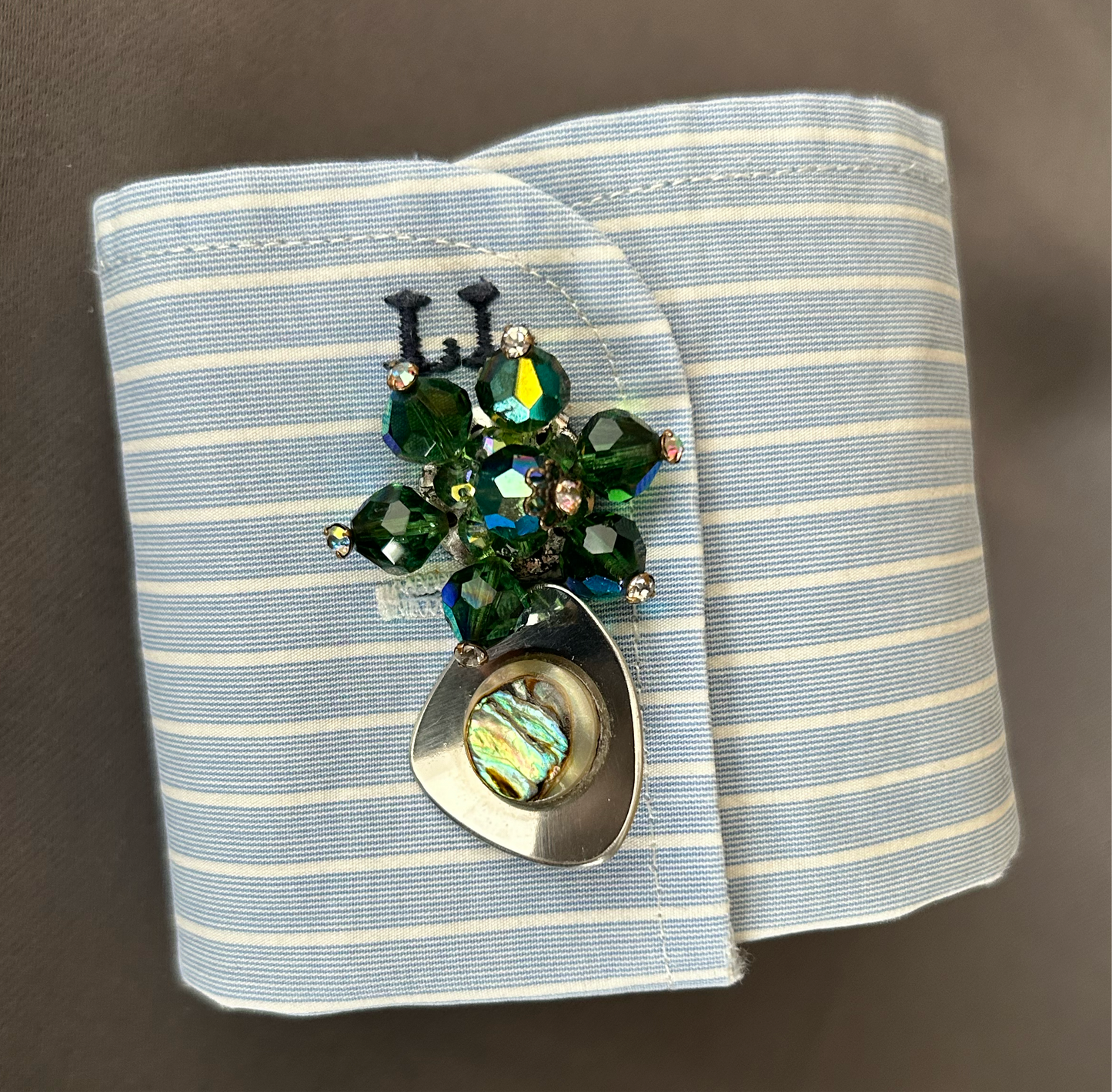 Striped cuff bracelet with cufflinks