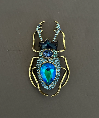 Beetle blue brooch